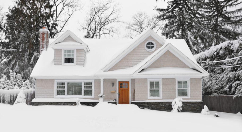 snow covered house utilizing proper water management